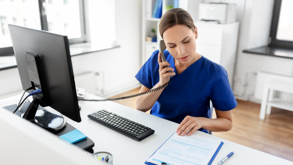 Doctor Using Hospital Phone