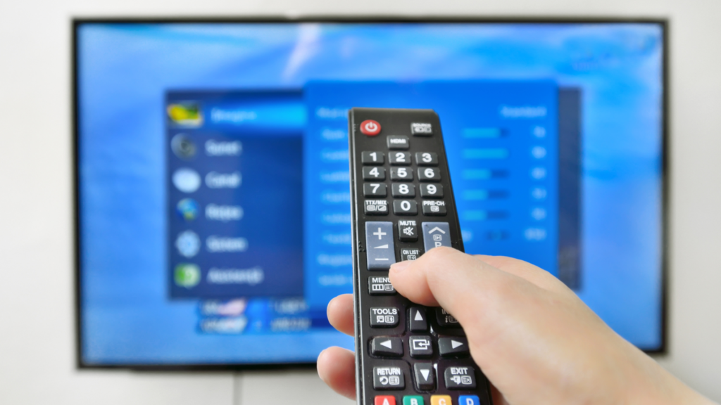 PersonChangingTVChannel