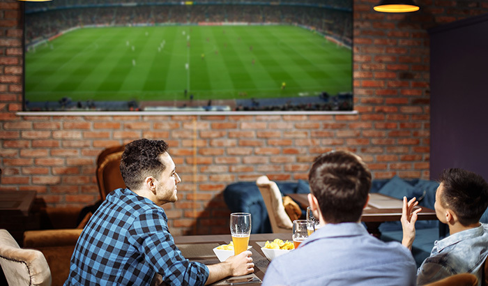 This Is How Sports Bars Sync TVs Together