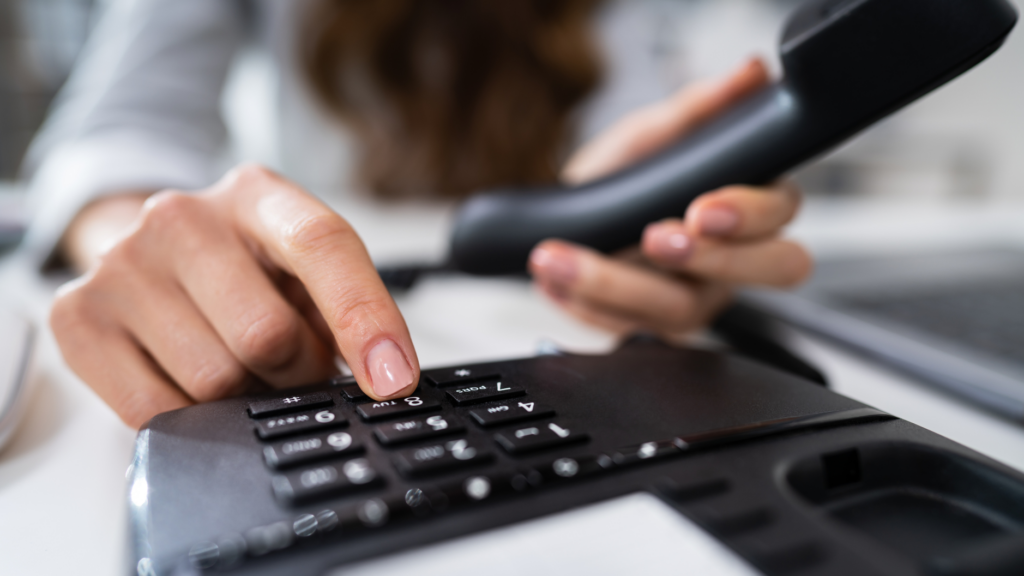 Person Using VoIP Phone System