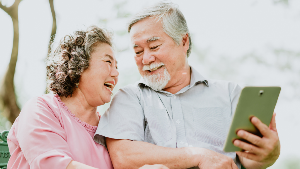 Seniors Watching TV on Tablet