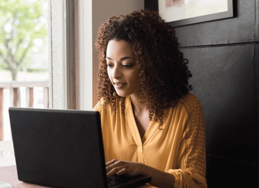 Woman using wi-fi at hotel