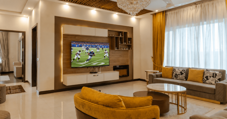 Clubhouse at apartment complex with football game on TV