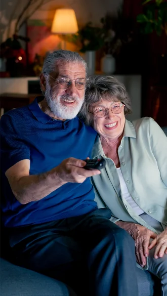 Couple at Senior Living Community Watching TV