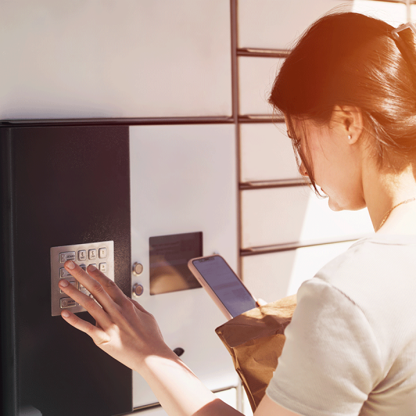 Resident Opening Parcel Locker to Get Package