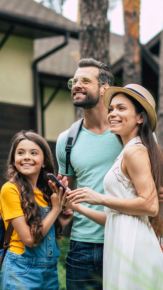 Family Using Cell Phone Outside Because of Robust Cellular Amplification