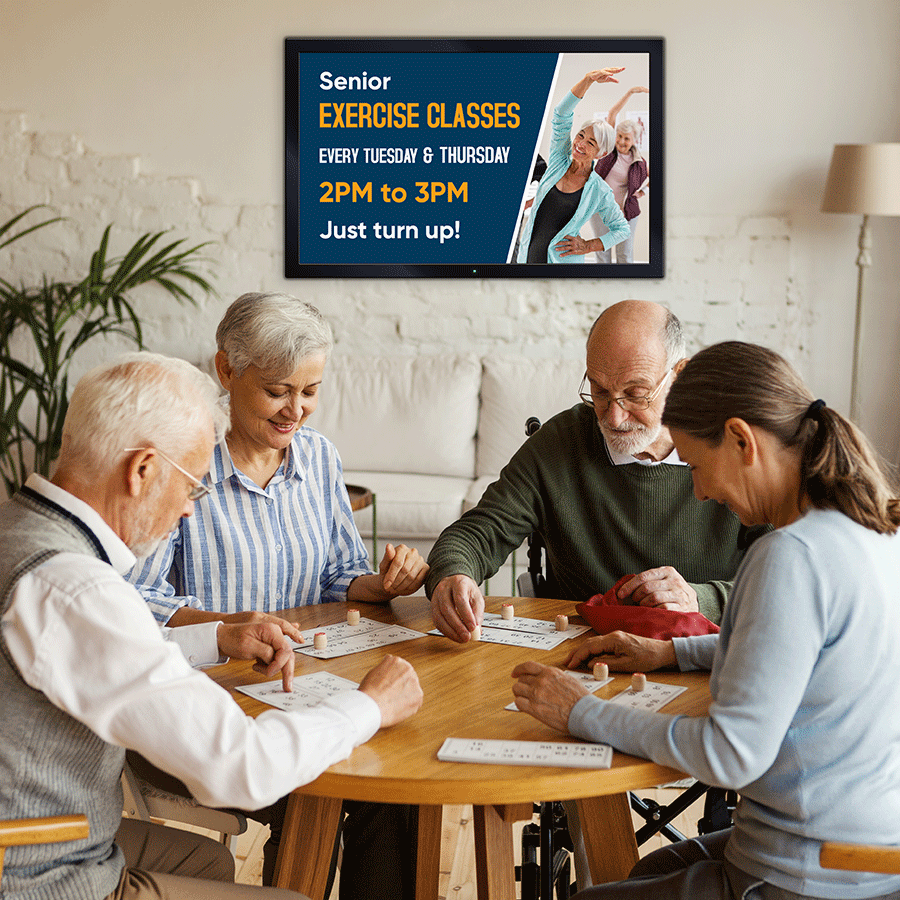 Seniors Playing Games at Community Event Promoted by Digital Signage