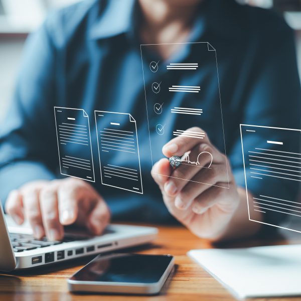 Businesswoman using digital device signs electronic documents online. Paperless workplace idea, e-signing, electronic signature, Technology and document management. future business contract signing.