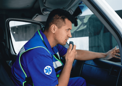 First responder on radio communicating with ERCES DAS in commercial building