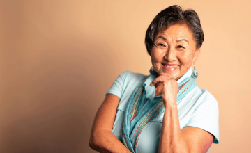 Happy senior woman who uses technology to stay connected and active