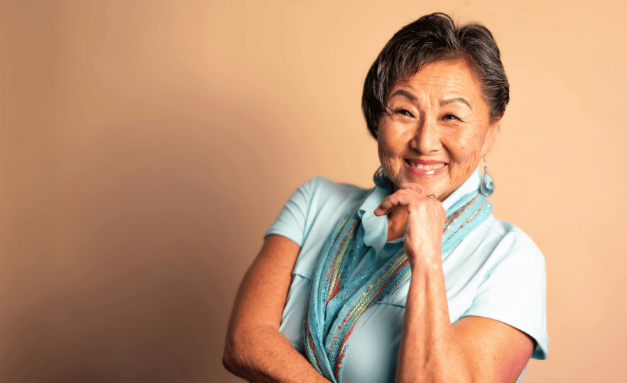 Happy senior woman who uses technology to stay connected and active