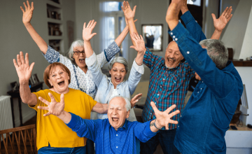Residents enjoying senior living technology in their community