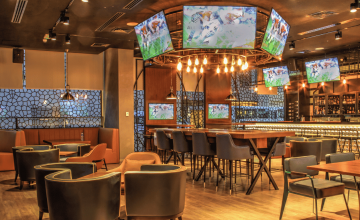 Synced TVs in a Hotel Lobby