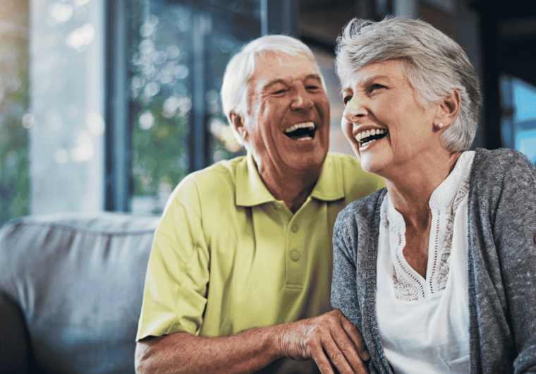 Couple enjoying IPTV services at senior living community