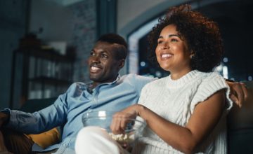 Couple Enjoying Reliable DIRECTV Service