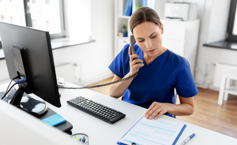 Doctor Using Hospital Phone
