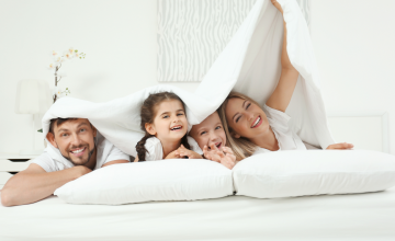 FamilyEnjoyingComfortableHotelTemperature
