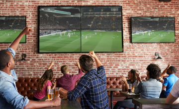 PatronsAtSportsBarWatchingTV