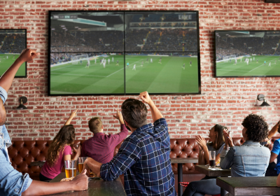 PatronsAtSportsBarWatchingTV