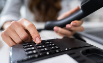 Person Using VoIP Phone System