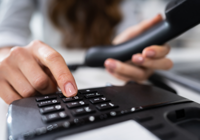 Person Using VoIP Phone System
