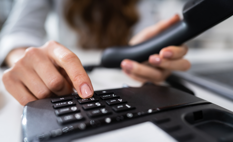 Person Using VoIP Phone System
