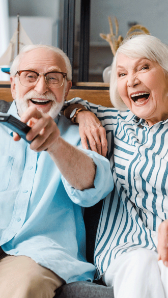 Senior-couple-wRemote