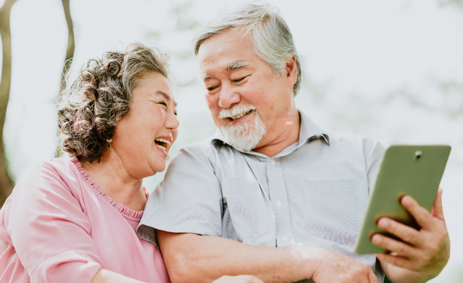 Seniors Watching TV on Tablet