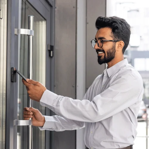man-at-door-phone-access-1-e1749858995462