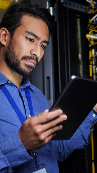 Technician Checking Cabling Panel