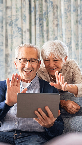 senior-couple-on-video-call-tablet