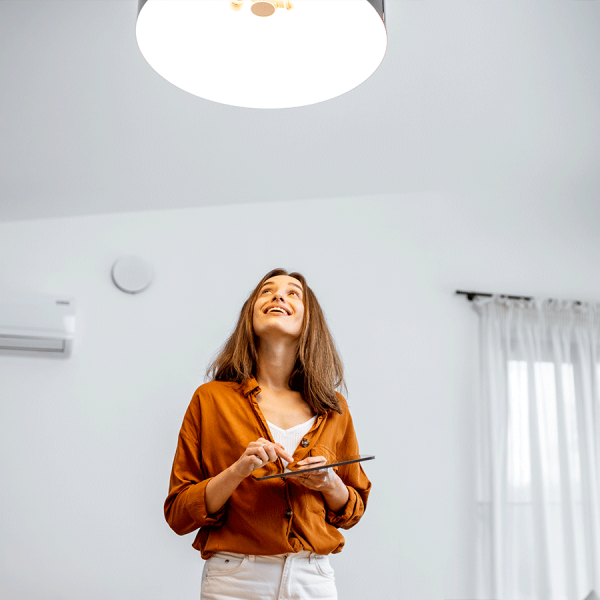 woman-looking-up-at-smart-lighting-2
